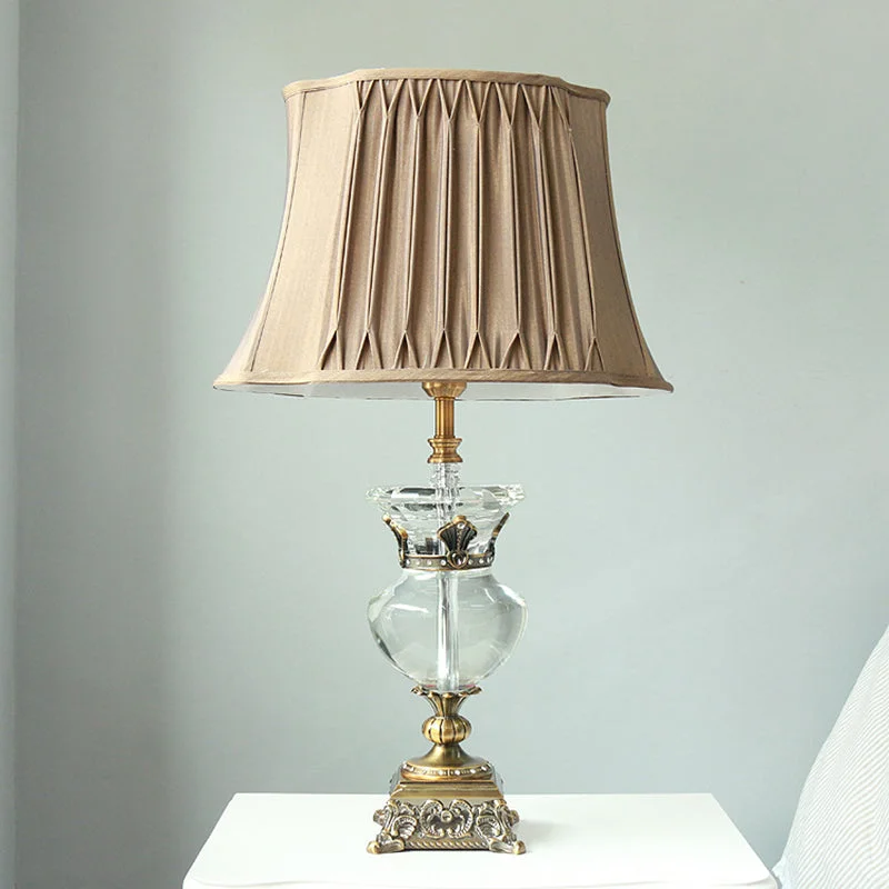 glass table lamps with a frosted surface for soft light diffusionglass table lamps with a frosted surface for soft light diffusionMinimalist Gold Bell Night Lamp with Clear K9 Crystal Shade and Stylish Urn-Shaped Base